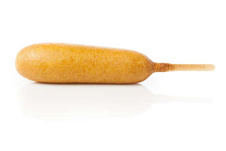 Organic CornDog on a stick with ketchup and mustardの写真素材