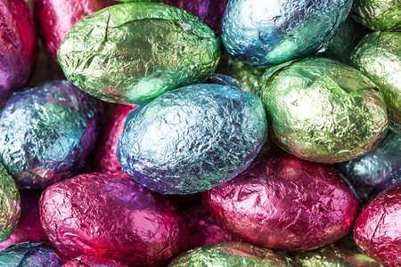 Colorful Chocolate Easter Egg Candy wrapped in foilの写真素材