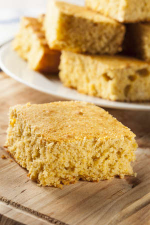 Golden Organic Homemade Cornbread cut into squares