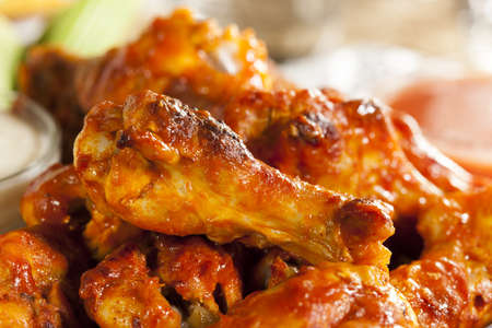 Hot and Spicey Buffalo Chicken Wings with celeryの写真素材