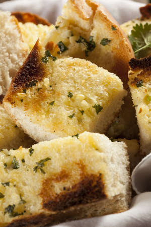 Homemade Crunchy Garlic Bread with butter and parsley
