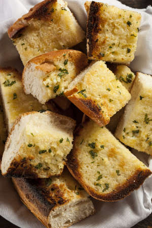 Homemade Crunchy Garlic Bread with butter and parsley