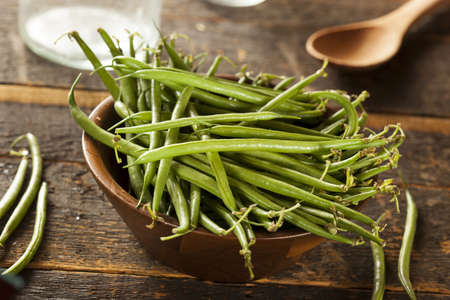 Fresh Organic Raw French Green Beans on a background