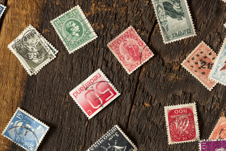 Colorful Vintage Used Postage Stamps in a pileのeditorial素材