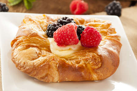 Homemade Gourmet Danish Pastry with berries and icing