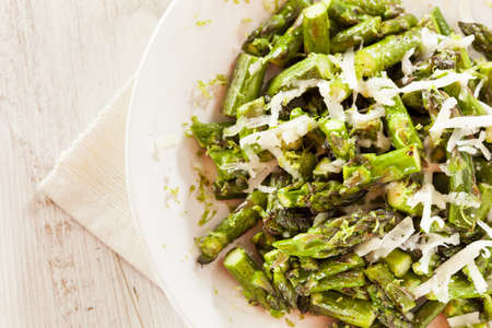 Healthy Sauteed Chopped Asparagus with Cheese and Limeの写真素材