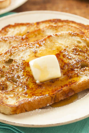 Homemade French Toast with Butter and Powdered Sugar