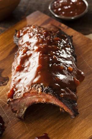 Smoked Barbecue Pork Spare Ribs with Sauceの写真素材