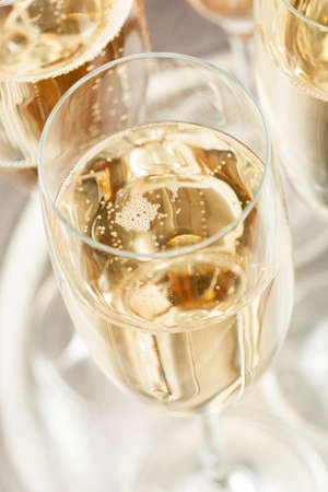 Bubbling Champagne in a Glass for a Celebrationの写真素材