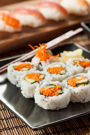Healthy Japanese Vegetable Maki Sushi Roll with Rice and Fishの写真素材