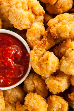 Organic Breaded Popcorn Shrimp with Cocktail Sauceの写真素材