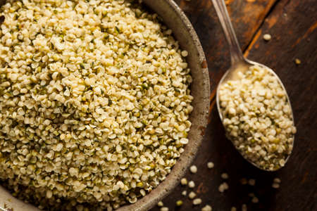 Healthy Organic Hulled Hemp Seeds in a Bowlの写真素材