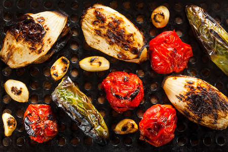 Healthy Organic Roasted Vegetables with Peppers, Tomatoes, and Onionの写真素材