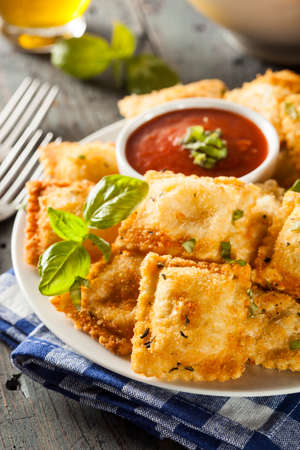 Homemade Fried Ravioli with Marinara Sauce and Basilの写真素材