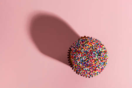 Assorted Fancy Gourmet Cupcakes with Frosting on a Backgroundの写真素材