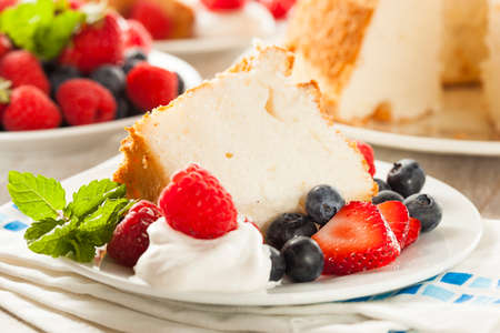 Homemade Angel Food Cake with Fresh Berriesの写真素材