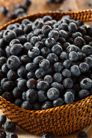 Fresh Organic Raw Blueberries in a Basketの写真素材