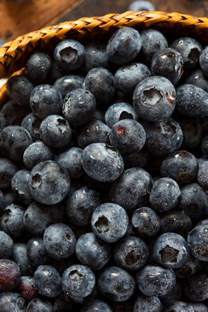 Fresh Organic Raw Blueberries in a Basketの写真素材