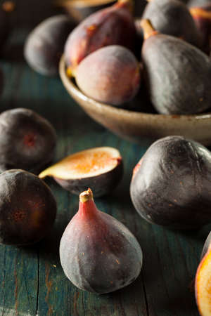 Raw Purple Organic Figs on a Background