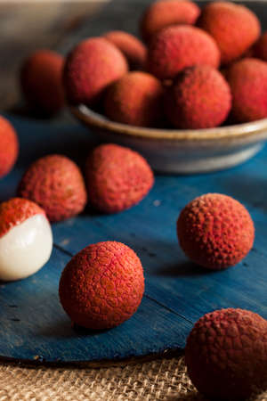 Healthy Organic Red Lychee on a Backgroundの写真素材