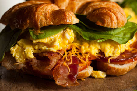 Ham and Cheese Egg Breakfast Sandwich on a Croissantの写真素材