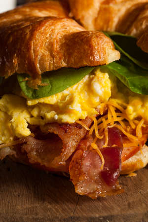 Ham and Cheese Egg Breakfast Sandwich on a Croissantの写真素材