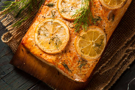 Homemade Grilled Salmon on a Cedar Plank with Dillの写真素材