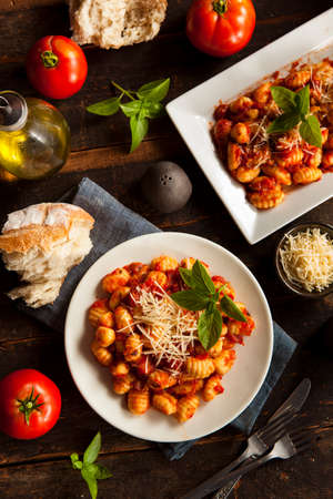 Homemade Italian Gnocchi with Red Sauce and Cheeseの写真素材