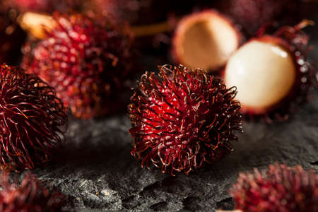 Fresh Organic Tropical Rambutan on a Backgroundの写真素材