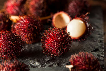 Fresh Organic Tropical Rambutan on a Backgroundの写真素材