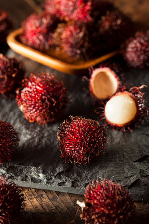 Fresh Organic Tropical Rambutan on a Backgroundの写真素材