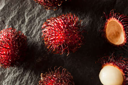 Fresh Organic Tropical Rambutan on a Backgroundの写真素材