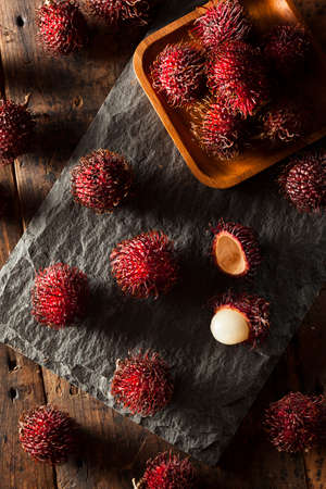 Fresh Organic Tropical Rambutan on a Backgroundの写真素材
