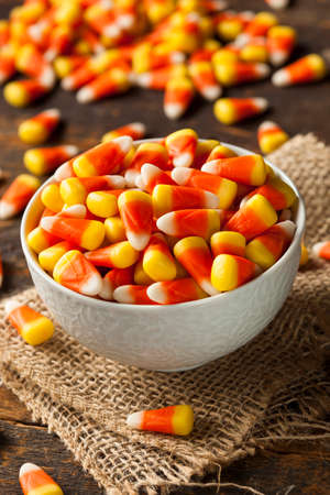 Colorful Candy Corn for Halloween on a Backgroundの写真素材