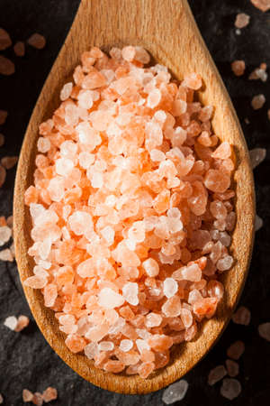 Raw Pink Himalayan Sea Salt in a Spoonの写真素材