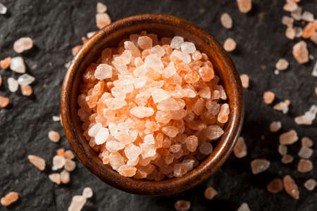 Raw Pink Himalayan Sea Salt in a Spoonの写真素材