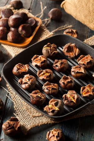 Hot Brown Roasted Chestnuts Ready to Eatの写真素材