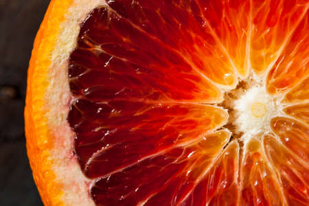 Organic Raw Red Blood Oranges on a Background