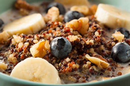 Organic Breakfast Quinoa with Nuts Milk and Berriesの写真素材