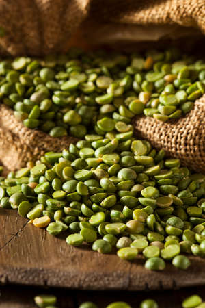 Raw Organic Green Split Peas in a Spoon
