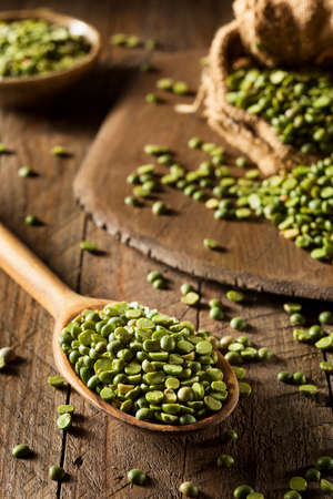 Raw Organic Green Split Peas in a Spoon