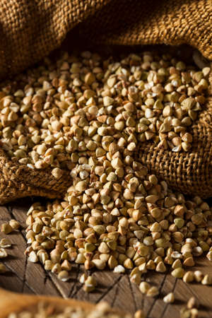 Raw Dry Organic Buckwheat in a Spoonの写真素材