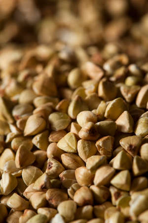 Raw Dry Organic Buckwheat in a Spoonの写真素材