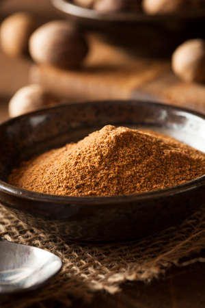 Raw Organic Dry Nutmeg to Use as a Spiceの写真素材