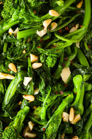Homemade Sauteed Green Broccoli Rabe with Garlic and Nutsの写真素材