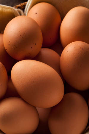 Raw Organic Brown Eggs in a Basket