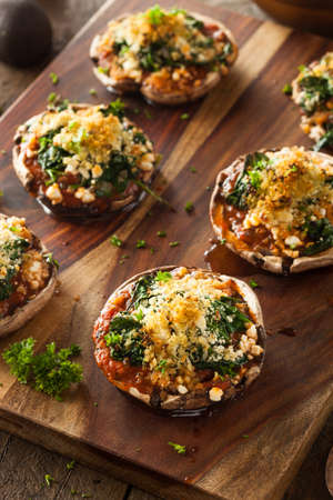 Homemade Baked Stuffed Portabello Mushrooms with Spinach and Cheeseの写真素材