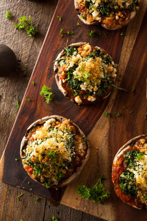 Homemade Baked Stuffed Portabello Mushrooms with Spinach and Cheeseの写真素材