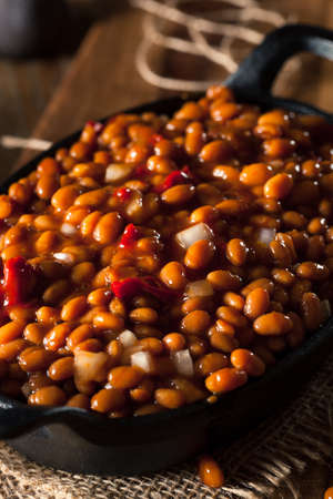 Homemade Barbecue Baked Beans in a Black Skilletの写真素材