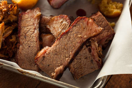 Homemade Smoked Barbecue Beef Brisket with Sauceの写真素材